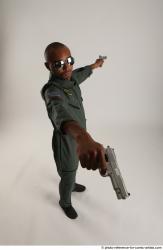 ERIC PILOT STANDING POSE WITH GUNS